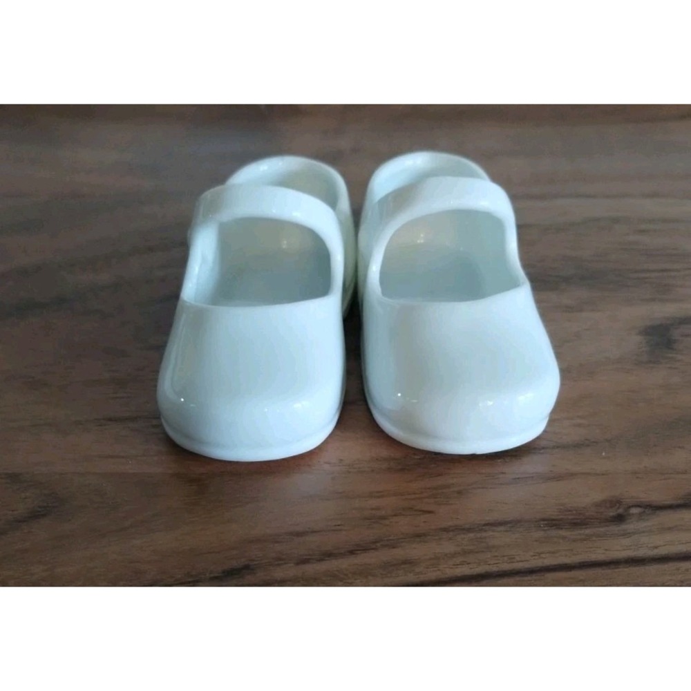 Tiny white porcelain shoes. 3" long.  Excellent condition. Rynne China